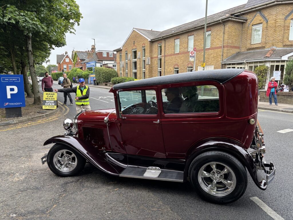 Deputy Mayor of Barnet Councillor Danny Rich arrives in open top Bentley to officially open 10th annual Barnet Classic Car show at The Spires