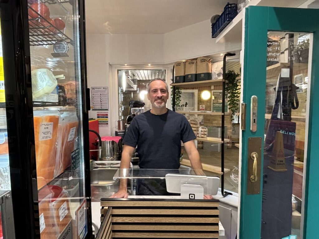 From starting with a stall in Barnet Market to opening a shop in The Spires shopping centre-- delicatessen trader's new opportunity. 