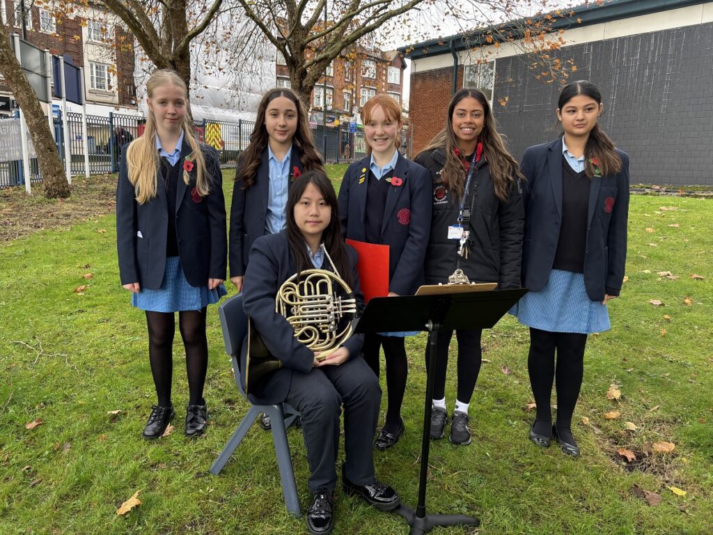 Queen Elizabeth's Girls' School, Barnet, hold Remembrance ceremony on Armistice Day as Prince William reminds young people about importance on the red poppy
